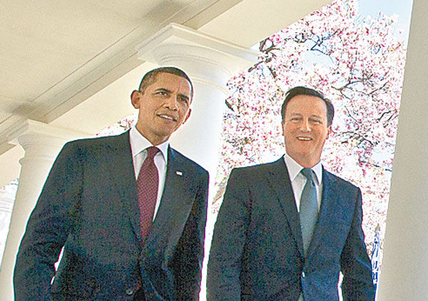 奧巴馬（左）與卡梅倫（右）商討對敍國的行動。圖為卡梅倫去年到訪白宮。