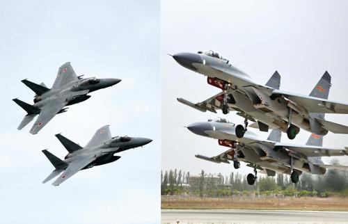 日本航空自衛隊的F－15（左）和中國空軍蘇－30戰機